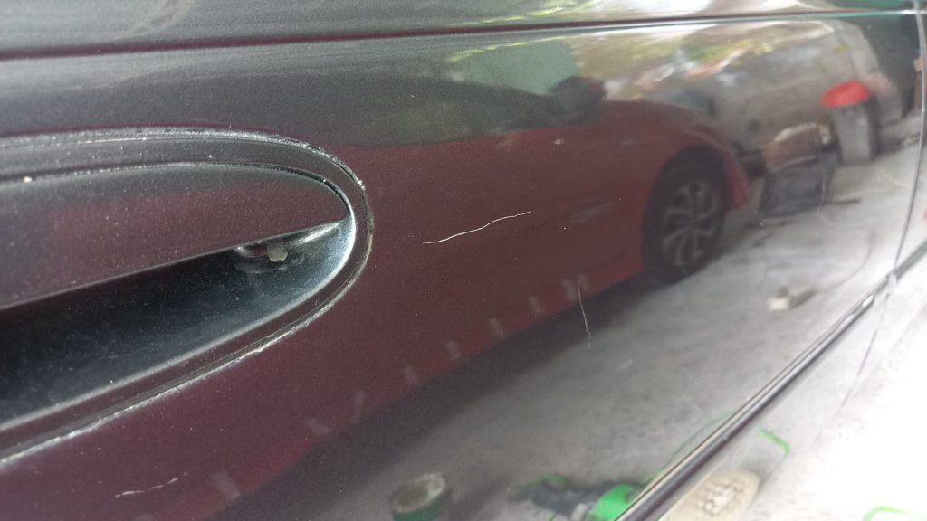 How to Remove Light Scratches from Car Paint by Hand